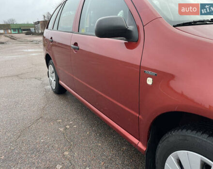 Красный Шкода Фабия, объемом двигателя 1.2 л и пробегом 217 тыс. км за 3550 $, фото 15 на Automoto.ua