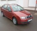 Красный Шкода Фабия, объемом двигателя 1.2 л и пробегом 214 тыс. км за 3800 $, фото 6 на Automoto.ua