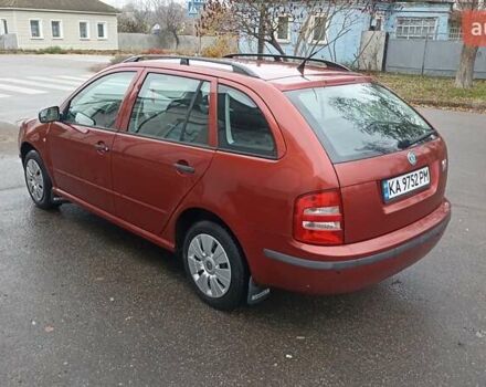Красный Шкода Фабия, объемом двигателя 1.2 л и пробегом 214 тыс. км за 3800 $, фото 1 на Automoto.ua