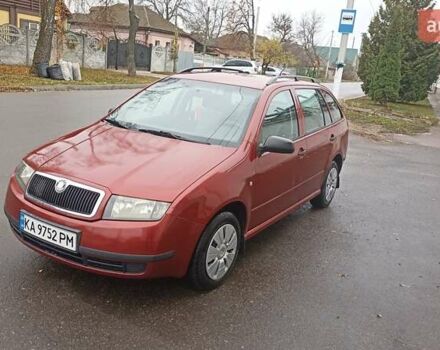 Красный Шкода Фабия, объемом двигателя 1.2 л и пробегом 214 тыс. км за 3800 $, фото 4 на Automoto.ua