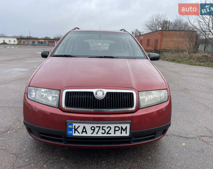 Красный Шкода Фабия, объемом двигателя 1.2 л и пробегом 217 тыс. км за 3550 $, фото 1 на Automoto.ua