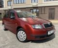 Красный Шкода Фабия, объемом двигателя 1.2 л и пробегом 200 тыс. км за 1751 $, фото 1 на Automoto.ua