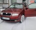 Красный Шкода Фабия, объемом двигателя 1.4 л и пробегом 257 тыс. км за 3100 $, фото 1 на Automoto.ua