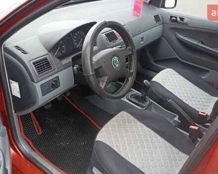 Красный Шкода Фабия, объемом двигателя 1.2 л и пробегом 214 тыс. км за 3800 $, фото 7 на Automoto.ua
