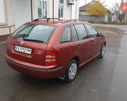 Красный Шкода Фабия, объемом двигателя 1.2 л и пробегом 214 тыс. км за 3800 $, фото 3 на Automoto.ua
