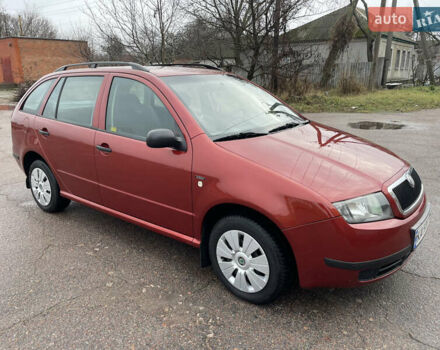 Красный Шкода Фабия, объемом двигателя 1.2 л и пробегом 217 тыс. км за 3550 $, фото 2 на Automoto.ua