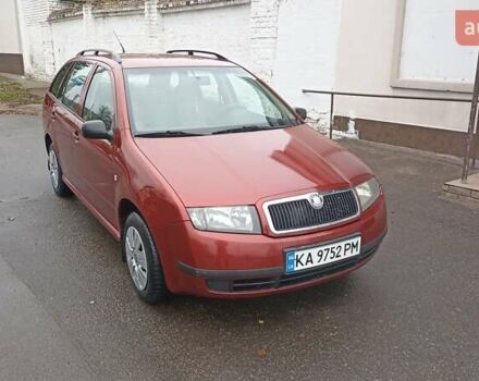 Красный Шкода Фабия, объемом двигателя 1.2 л и пробегом 214 тыс. км за 3800 $, фото 2 на Automoto.ua