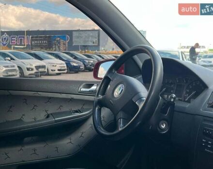Красный Шкода Фабия, объемом двигателя 1.4 л и пробегом 282 тыс. км за 4890 $, фото 12 на Automoto.ua