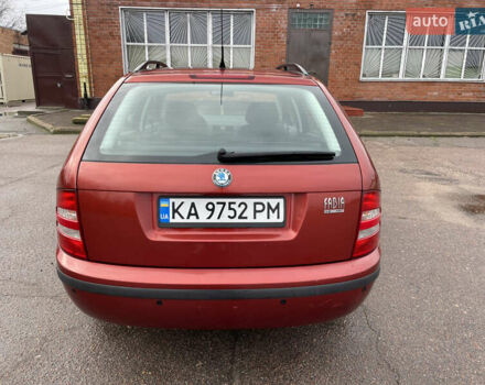 Красный Шкода Фабия, объемом двигателя 1.2 л и пробегом 217 тыс. км за 3550 $, фото 10 на Automoto.ua