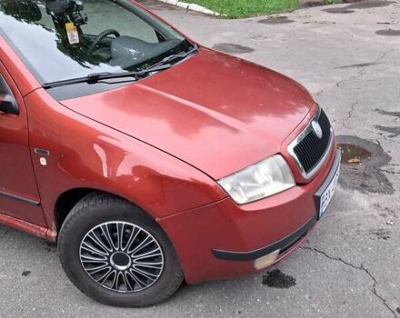 Красный Шкода Фабия, объемом двигателя 1.2 л и пробегом 268 тыс. км за 3500 $, фото 2 на Automoto.ua