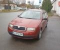 Красный Шкода Фабия, объемом двигателя 1.2 л и пробегом 214 тыс. км за 3800 $, фото 1 на Automoto.ua