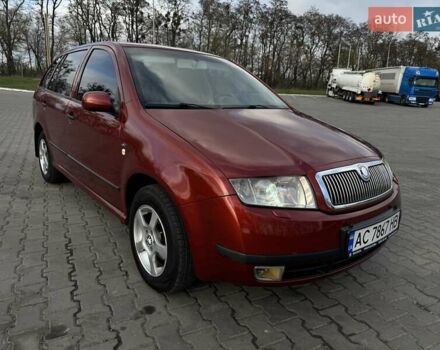 Красный Шкода Фабия, объемом двигателя 1.39 л и пробегом 258 тыс. км за 4000 $, фото 2 на Automoto.ua