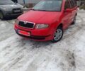 Красный Шкода Фабия, объемом двигателя 1.4 л и пробегом 216 тыс. км за 3500 $, фото 1 на Automoto.ua