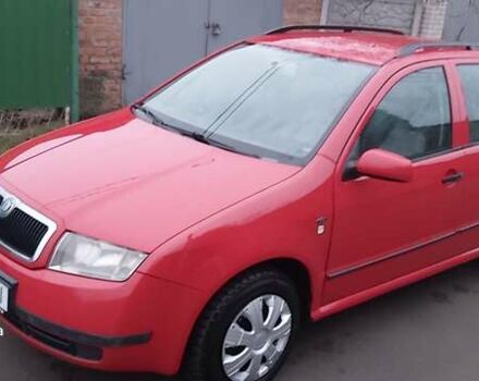 Красный Шкода Фабия, объемом двигателя 1.39 л и пробегом 180 тыс. км за 3999 $, фото 4 на Automoto.ua