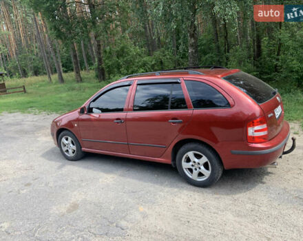 Красный Шкода Фабия, объемом двигателя 1.39 л и пробегом 238 тыс. км за 4850 $, фото 2 на Automoto.ua