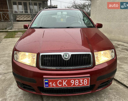 Красный Шкода Фабия, объемом двигателя 1.4 л и пробегом 169 тыс. км за 4200 $, фото 3 на Automoto.ua