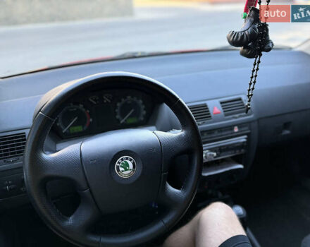 Красный Шкода Фабия, объемом двигателя 1.39 л и пробегом 241 тыс. км за 4399 $, фото 15 на Automoto.ua