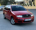 Красный Шкода Фабия, объемом двигателя 1.39 л и пробегом 241 тыс. км за 4399 $, фото 1 на Automoto.ua