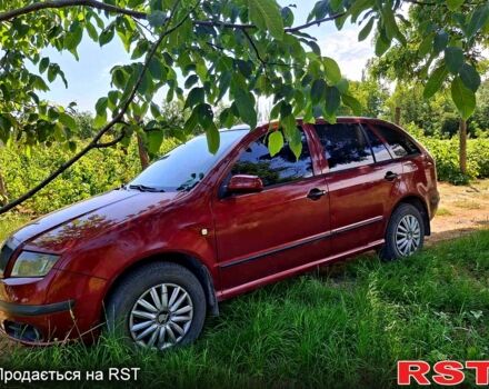 Красный Шкода Фабия, объемом двигателя 1.2 л и пробегом 240 тыс. км за 3500 $, фото 7 на Automoto.ua
