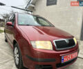 Красный Шкода Фабия, объемом двигателя 1.4 л и пробегом 169 тыс. км за 4200 $, фото 1 на Automoto.ua