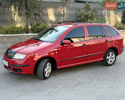 Красный Шкода Фабия, объемом двигателя 1.39 л и пробегом 241 тыс. км за 4399 $, фото 7 на Automoto.ua