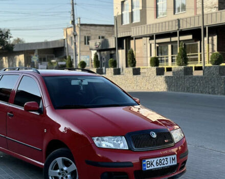 Красный Шкода Фабия, объемом двигателя 1.39 л и пробегом 241 тыс. км за 4399 $, фото 1 на Automoto.ua