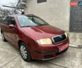 Красный Шкода Фабия, объемом двигателя 1.4 л и пробегом 169 тыс. км за 4200 $, фото 1 на Automoto.ua