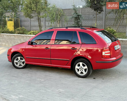 Красный Шкода Фабия, объемом двигателя 1.39 л и пробегом 241 тыс. км за 4399 $, фото 6 на Automoto.ua