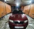 Красный Шкода Фабия, объемом двигателя 1.2 л и пробегом 303 тыс. км за 3800 $, фото 1 на Automoto.ua