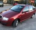 Красный Шкода Фабия, объемом двигателя 1.4 л и пробегом 196 тыс. км за 3900 $, фото 1 на Automoto.ua