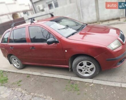 Красный Шкода Фабия, объемом двигателя 1.2 л и пробегом 295 тыс. км за 3250 $, фото 1 на Automoto.ua