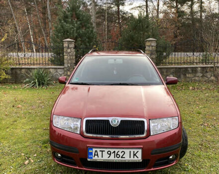 Красный Шкода Фабия, объемом двигателя 1.39 л и пробегом 194 тыс. км за 4490 $, фото 2 на Automoto.ua