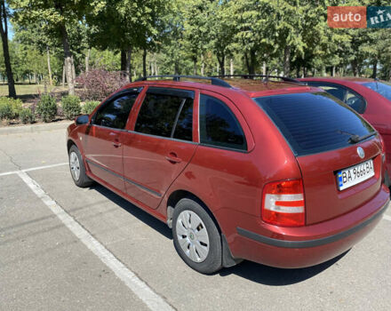 Красный Шкода Фабия, объемом двигателя 1.39 л и пробегом 264 тыс. км за 5300 $, фото 3 на Automoto.ua