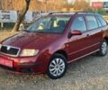 Красный Шкода Фабия, объемом двигателя 1.39 л и пробегом 201 тыс. км за 4199 $, фото 4 на Automoto.ua