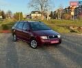 Красный Шкода Фабия, объемом двигателя 1.39 л и пробегом 201 тыс. км за 4199 $, фото 7 на Automoto.ua