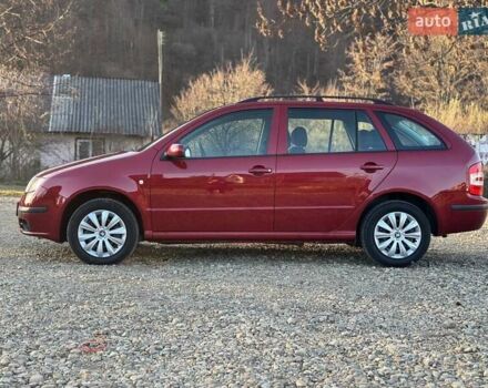 Красный Шкода Фабия, объемом двигателя 1.39 л и пробегом 201 тыс. км за 4199 $, фото 10 на Automoto.ua