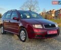 Красный Шкода Фабия, объемом двигателя 1.39 л и пробегом 201 тыс. км за 4199 $, фото 3 на Automoto.ua