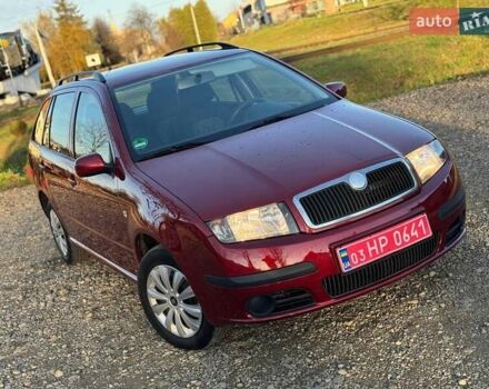 Красный Шкода Фабия, объемом двигателя 1.39 л и пробегом 201 тыс. км за 4199 $, фото 6 на Automoto.ua