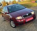 Красный Шкода Фабия, объемом двигателя 1.39 л и пробегом 201 тыс. км за 4199 $, фото 6 на Automoto.ua