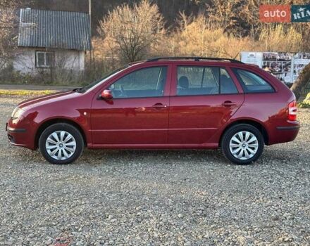 Красный Шкода Фабия, объемом двигателя 1.39 л и пробегом 201 тыс. км за 4199 $, фото 11 на Automoto.ua