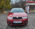 Красный Шкода Фабия, объемом двигателя 1.39 л и пробегом 212 тыс. км за 3800 $, фото 2 на Automoto.ua