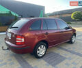 Красный Шкода Фабия, объемом двигателя 1.2 л и пробегом 203 тыс. км за 3800 $, фото 6 на Automoto.ua