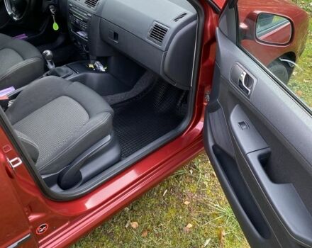 Червоний Шкода Фабія, об'ємом двигуна 1.4 л та пробігом 193 тис. км за 4550 $, фото 5 на Automoto.ua