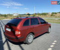 Красный Шкода Фабия, объемом двигателя 1.39 л и пробегом 264 тыс. км за 5300 $, фото 2 на Automoto.ua