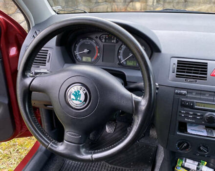 Красный Шкода Фабия, объемом двигателя 1.39 л и пробегом 194 тыс. км за 4490 $, фото 17 на Automoto.ua