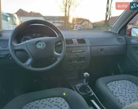 Красный Шкода Фабия, объемом двигателя 1.39 л и пробегом 201 тыс. км за 4199 $, фото 18 на Automoto.ua