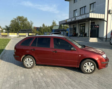 Красный Шкода Фабия, объемом двигателя 1.2 л и пробегом 300 тыс. км за 3600 $, фото 2 на Automoto.ua