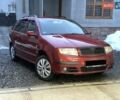 Красный Шкода Фабия, объемом двигателя 1.39 л и пробегом 260 тыс. км за 3900 $, фото 1 на Automoto.ua