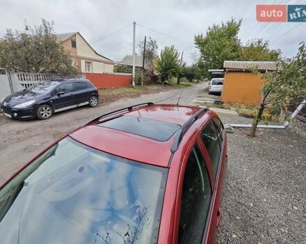 Красный Шкода Фабия, объемом двигателя 1.39 л и пробегом 226 тыс. км за 5300 $, фото 4 на Automoto.ua