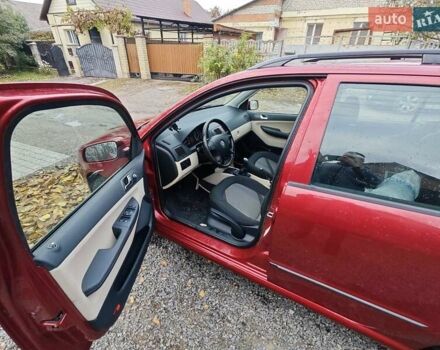 Красный Шкода Фабия, объемом двигателя 1.39 л и пробегом 226 тыс. км за 5300 $, фото 5 на Automoto.ua